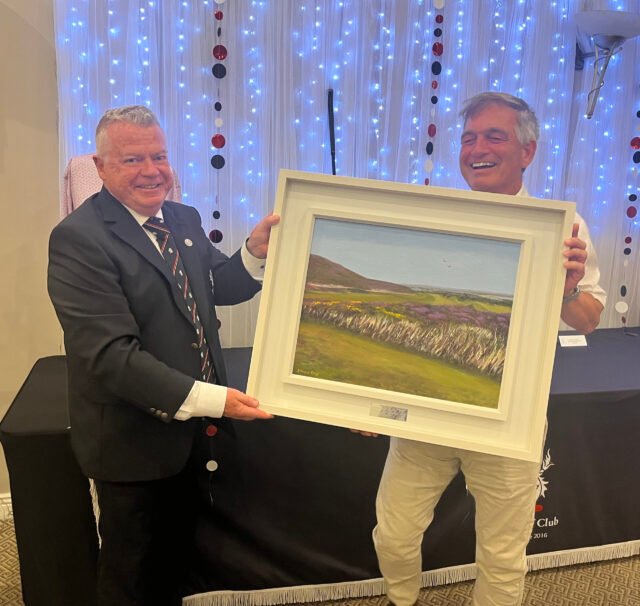 Captain-Donal-presenting-the-Captains-Prize-Golf-Champion-Brian-with-Heather-Commission-Painting-by-Yvonne-King